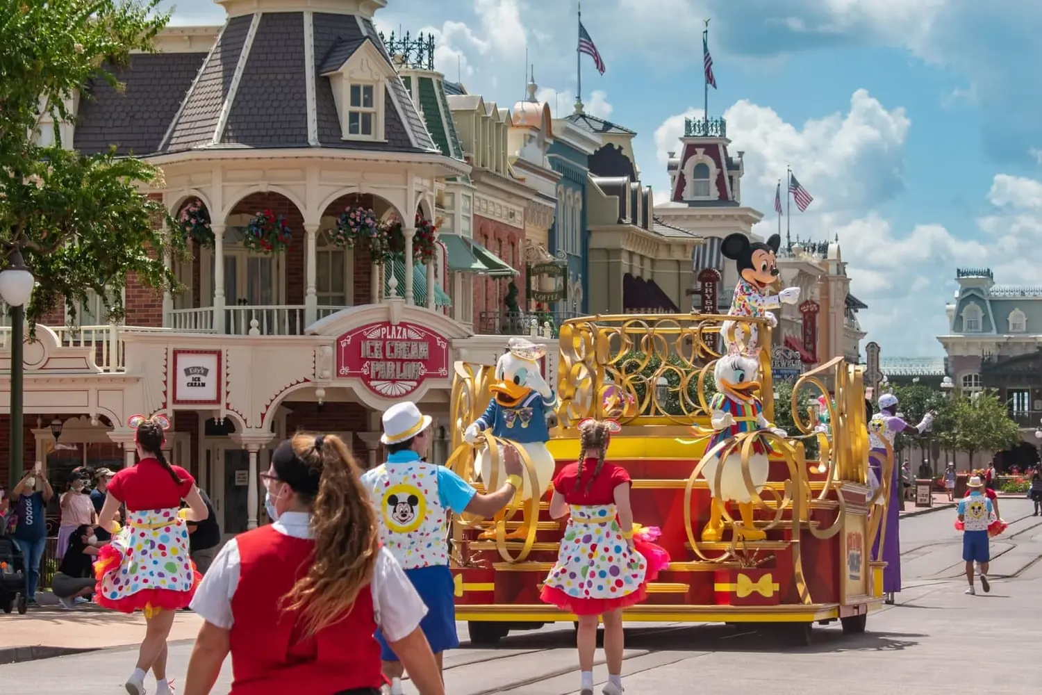 Main Street parade at Walt Disney World with Mickey, Donald, and Daisy